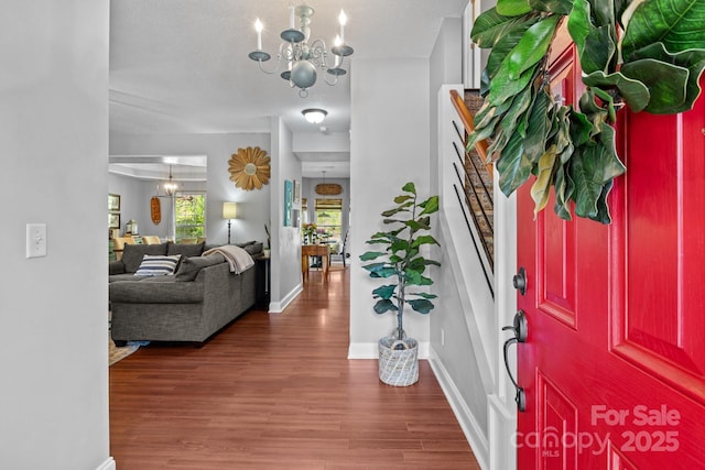 8700 Fox Tail Ln, Huntersville, NC 28078 - entryway featuring a chandelier and wood finished floors
