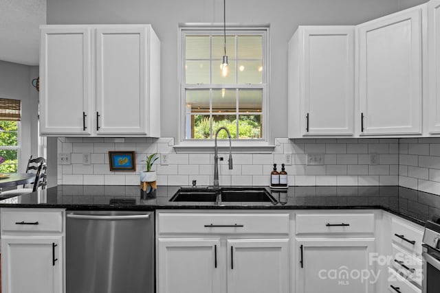 8700 Fox Tail Ln, Huntersville, NC 28078 - kitchen featuring stainless steel dishwasher, white cabinets, and backsplash