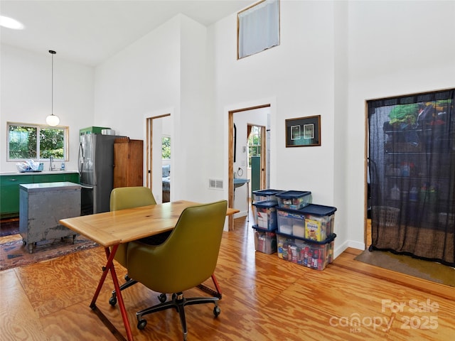 59 Alexander Rd, Weaverville, NC 28787 - dining space featuring a high ceiling, light wood-style floors, and an office area
