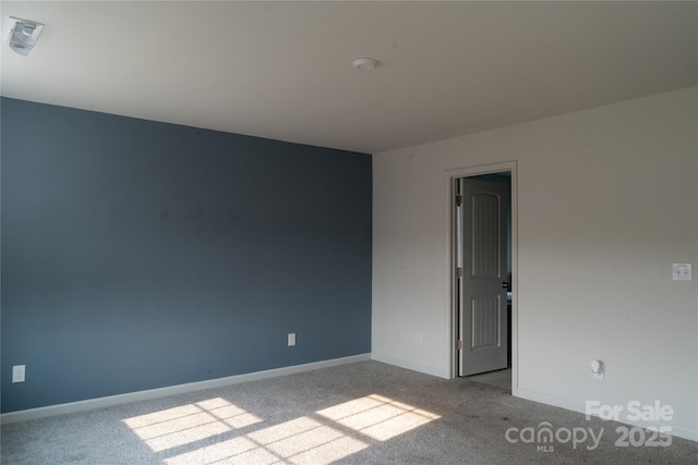 69 Ravibha Ct, Clayton, NC 27520 - carpeted empty room featuring baseboards