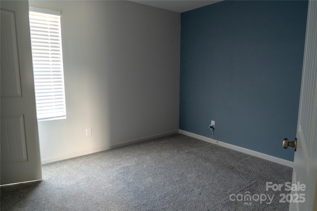 69 Ravibha Ct, Clayton, NC 27520 - empty room featuring carpet, healthy amount of natural light, and baseboards