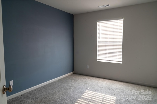 69 Ravibha Ct, Clayton, NC 27520 - empty room with carpet floors and baseboards