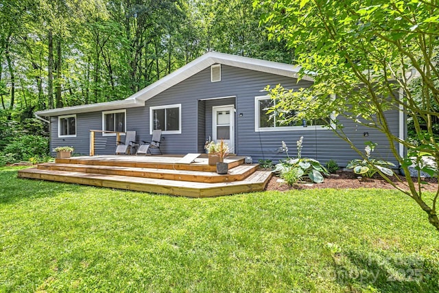 487 Duncan Creek Rd, Fletcher, NC 28732 - view of front of home featuring a front lawn and a wooden deck