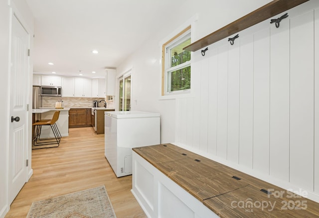 487 Duncan Creek Rd, Fletcher, NC 28732 - mudroom featuring light wood finished floors and recessed lighting