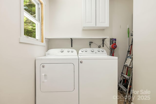 487 Duncan Creek Rd, Fletcher, NC 28732 - laundry area with washer and dryer and cabinet space