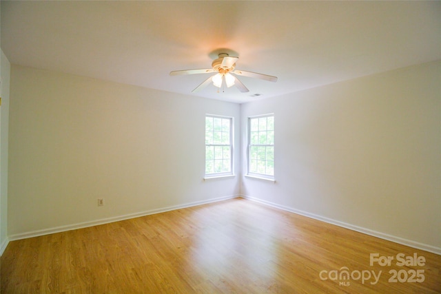 12314 Chickasaw Dr, Huntersville, NC 28078 - spare room with light wood finished floors and a ceiling fan
