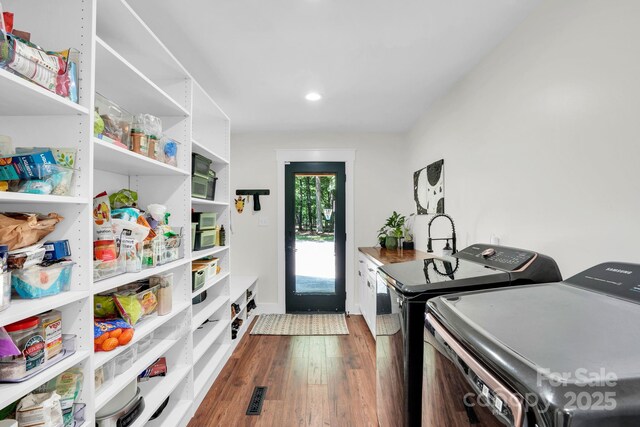 316 Wade Hampton Dr, Matthews, NC 28104 - washroom with washer and dryer, dark wood-type flooring, and recessed lighting