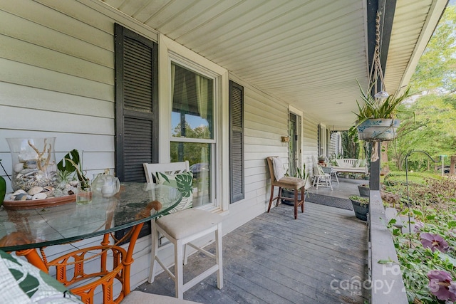 300 S Hudson Ave, Spencer, NC 28159 - wooden porch featuring outdoor dining space