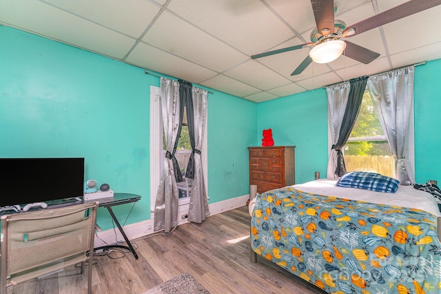 300 S Hudson Ave, Spencer, NC 28159 - bedroom with a drop ceiling, wood finished floors, and a ceiling fan