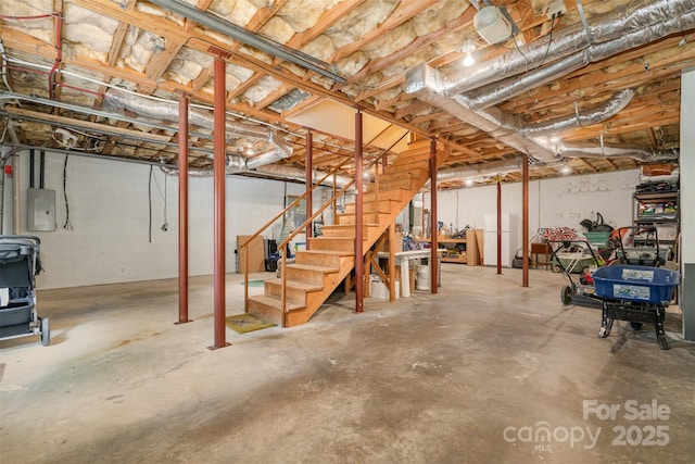 139 Palaside Dr NE, Concord, NC 28025 - unfinished below grade area featuring stairs and electric panel