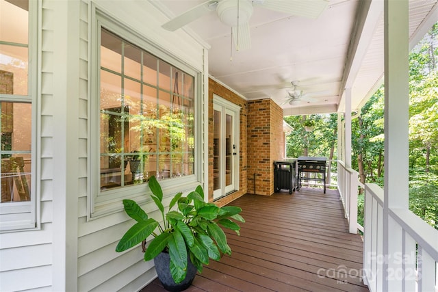 139 Palaside Dr NE, Concord, NC 28025 - wooden porch featuring a ceiling fan and grilling area