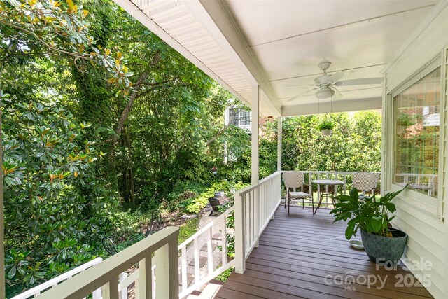 139 Palaside Dr NE, Concord, NC 28025 - wooden porch featuring a ceiling fan