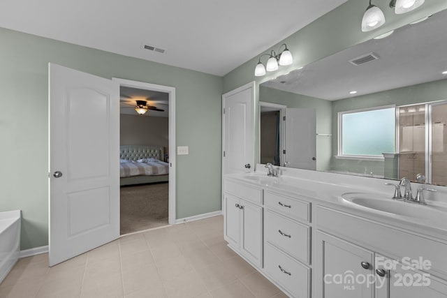 1569 Shannon Falls Dr, Fort Mill, SC 29715 - ensuite bathroom with double vanity, a ceiling fan, a bathtub, and a shower with door