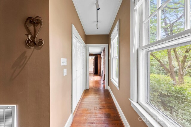 805 S Main St, Mount Holly, NC 28120 - hallway featuring wood finished floors and ornamental molding