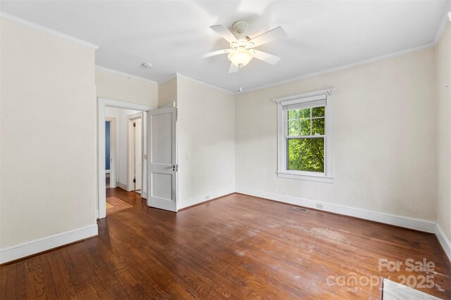 805 S Main St, Mount Holly, NC 28120 - spare room with wood finished floors, ceiling fan, crown molding, and a smoke detector