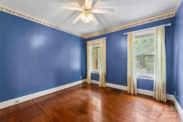 805 S Main St, Mount Holly, NC 28120 - unfurnished room featuring hardwood / wood-style flooring and a ceiling fan