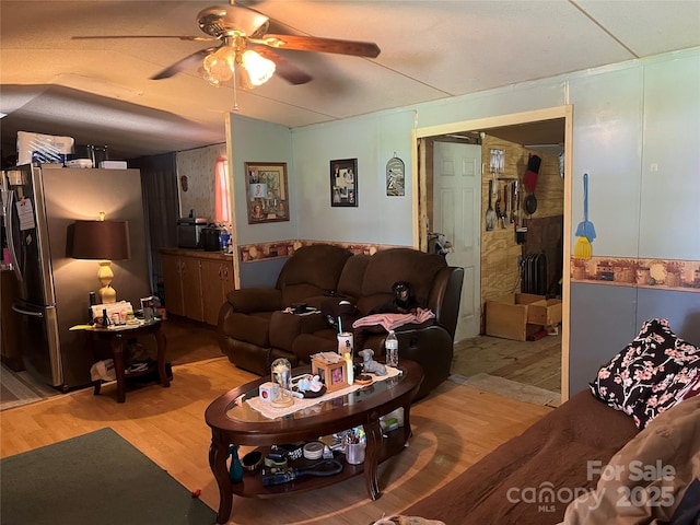 6785 Cobbs Pl, Connelly Springs, NC 28612 - living area with wood finished floors and ceiling fan