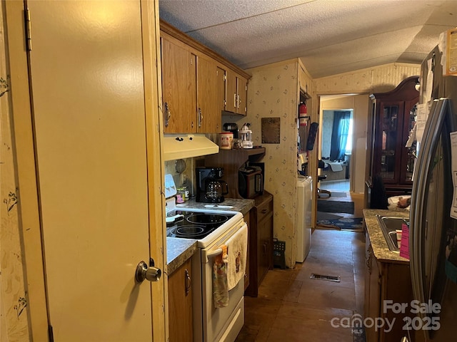 6785 Cobbs Pl, Connelly Springs, NC 28612 - kitchen with white electric range, custom range hood, brown cabinetry, a sink, and washer / clothes dryer