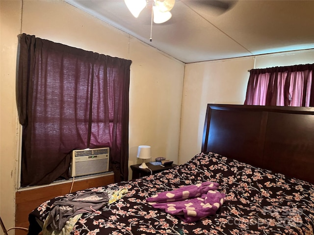 6785 Cobbs Pl, Connelly Springs, NC 28612 - bedroom featuring vaulted ceiling, a ceiling fan, and cooling unit