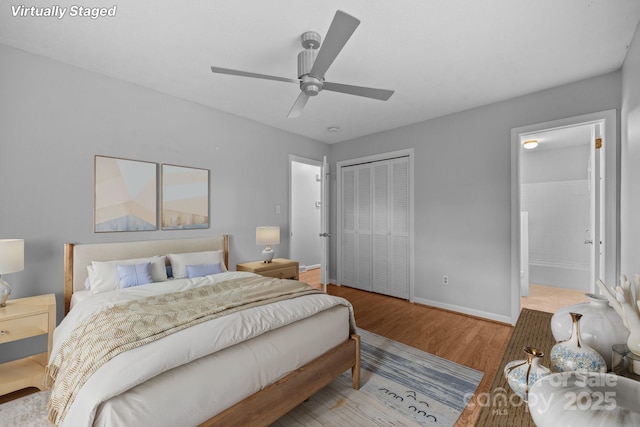 20 Summit Dr, Arden, NC 28704 - bedroom with wood finished floors, a closet, ceiling fan, and ensuite bathroom