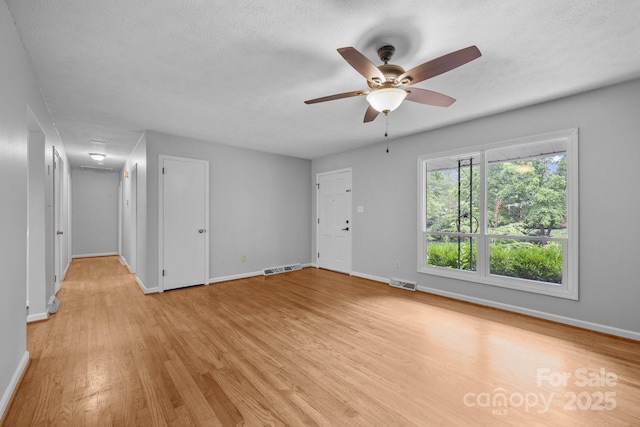 20 Summit Dr, Arden, NC 28704 - unfurnished room featuring light wood-type flooring and a ceiling fan