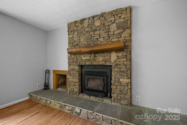 20 Summit Dr, Arden, NC 28704 - detailed view of wood finished floors and a stone fireplace