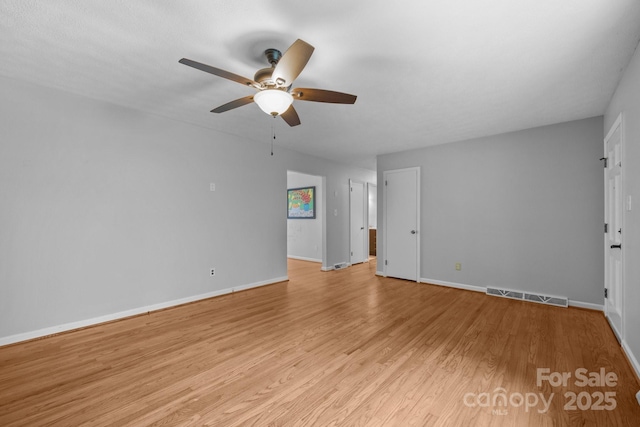20 Summit Dr, Arden, NC 28704 - empty room with ceiling fan and light wood finished floors