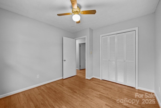 20 Summit Dr, Arden, NC 28704 - unfurnished bedroom featuring wood finished floors, a closet, and ceiling fan