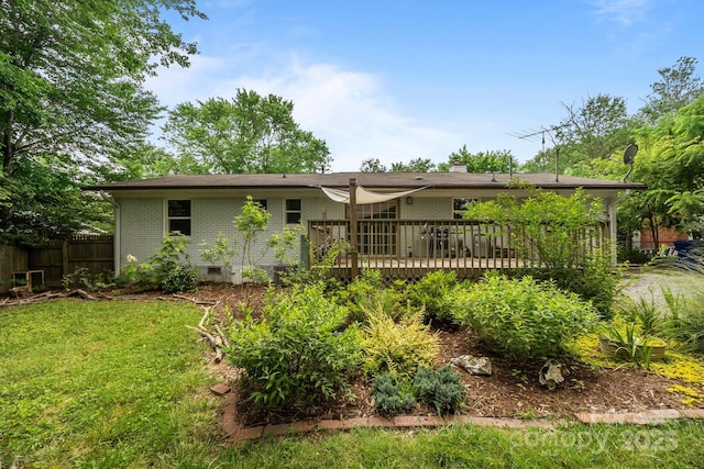 20 Summit Dr, Arden, NC 28704 - rear view of house with brick siding, a wooden deck, a chimney, and crawl space