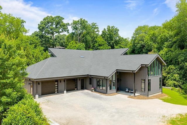 3304 Mar Vista Cir, Charlotte, NC 28209 - view of front of property with driveway, a garage, and a shingled roof