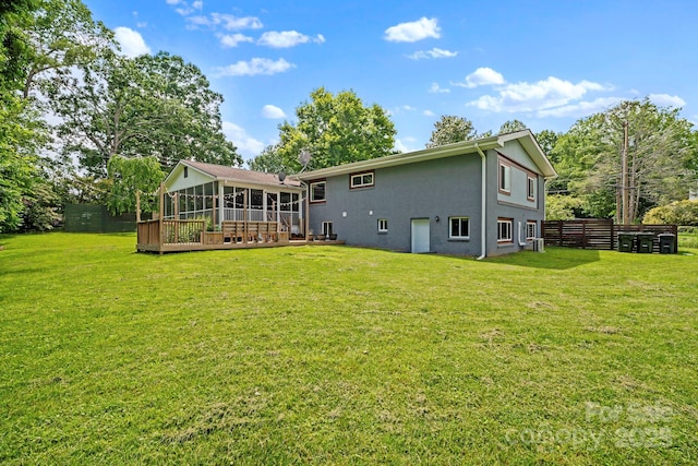 419 E Blue Ridge Rd, East Flat Rock, NC 28726 - back of house featuring a sunroom, stucco siding, and a deck