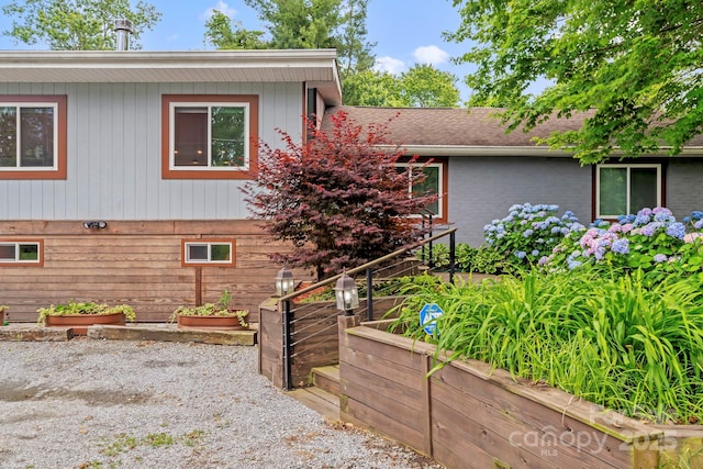 419 E Blue Ridge Rd, East Flat Rock, NC 28726 - view of front of home featuring a vegetable garden