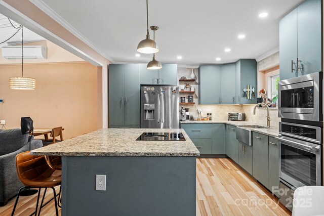 419 E Blue Ridge Rd, East Flat Rock, NC 28726 - kitchen with appliances with stainless steel finishes, an AC wall unit, open shelves, light wood finished floors, and backsplash