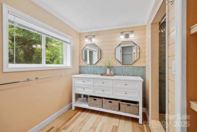 419 E Blue Ridge Rd, East Flat Rock, NC 28726 - bathroom with double vanity, wood finished floors, ornamental molding, and wooden walls