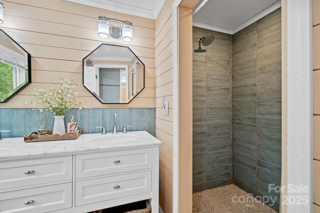 419 E Blue Ridge Rd, East Flat Rock, NC 28726 - full bathroom with a shower stall, vanity, ornamental molding, and wooden walls