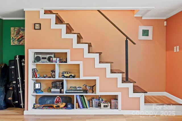 419 E Blue Ridge Rd, East Flat Rock, NC 28726 - stairway with ornamental molding and wood finished floors