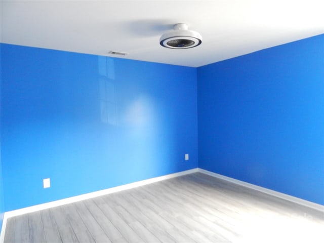 10615 Elm Bend Dr, Charlotte, NC 28273 - spare room featuring wood finished floors and baseboards