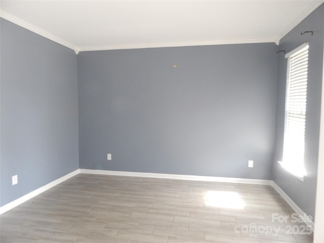 10615 Elm Bend Dr, Charlotte, NC 28273 - empty room with crown molding, wood finished floors, and plenty of natural light