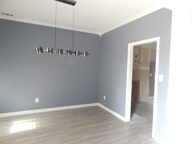 10615 Elm Bend Dr, Charlotte, NC 28273 - unfurnished room with ornamental molding and wood finished floors