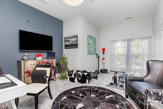 10203 Loch Lomond Dr, Charlotte, NC 28278 - living area featuring carpet flooring and a chandelier