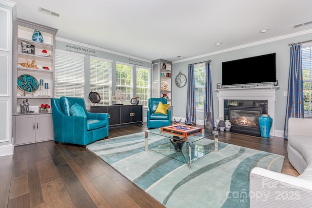 10203 Loch Lomond Dr, Charlotte, NC 28278 - living room featuring wood finished floors, crown molding, a glass covered fireplace, and recessed lighting