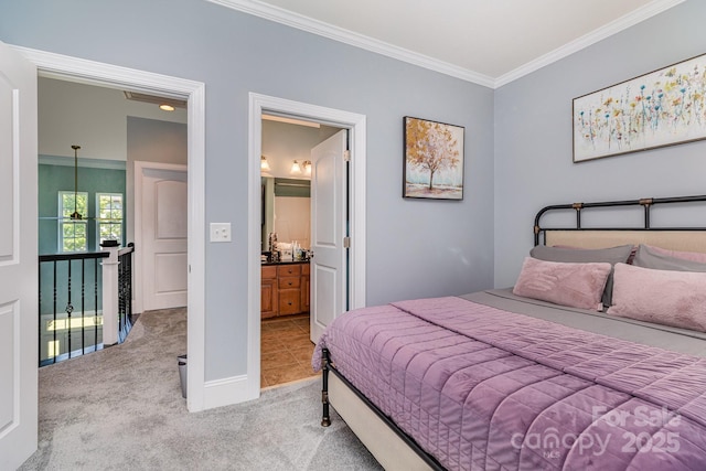 10203 Loch Lomond Dr, Charlotte, NC 28278 - carpeted bedroom with ornamental molding and connected bathroom