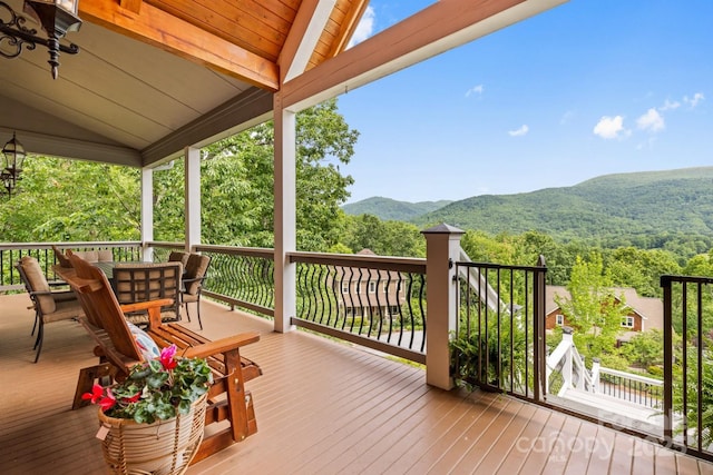 6 Grouse Ter, Fairview, NC 28730 - deck with outdoor dining area, a mountain view, and a wooded view