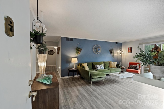 4736 Hedgemore Dr Unit K, Charlotte, NC 28209 - living area featuring wood finished floors and crown molding