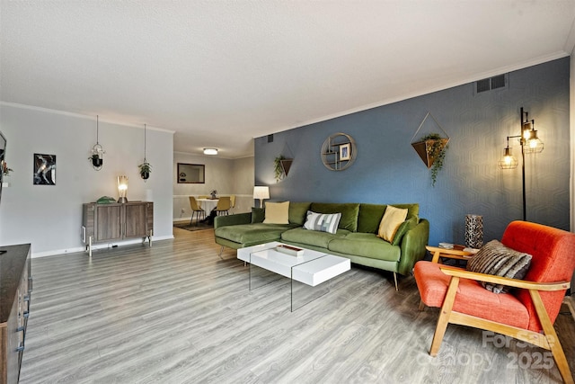 4736 Hedgemore Dr Unit K, Charlotte, NC 28209 - living area featuring wood finished floors and ornamental molding