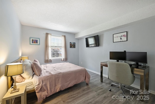 4736 Hedgemore Dr Unit K, Charlotte, NC 28209 - bedroom featuring a textured ceiling, wood finished floors, and an office area