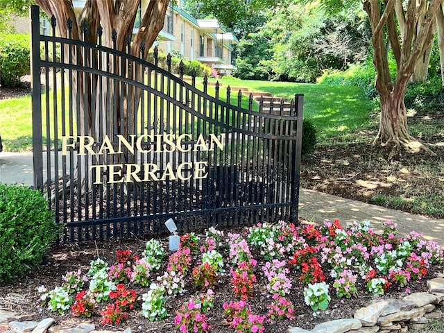 4736 Hedgemore Dr Unit K, Charlotte, NC 28209 - community / neighborhood sign featuring a lawn