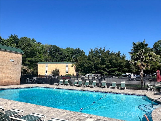 4736 Hedgemore Dr Unit K, Charlotte, NC 28209 - community pool with a patio area