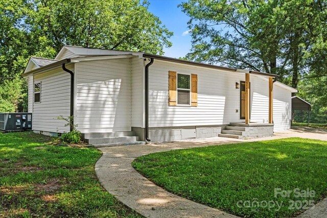 5740 Crouse Rd, Crouse, NC 28033 - view of front facade with a front yard and crawl space