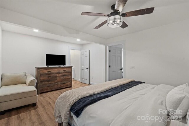 5740 Crouse Rd, Crouse, NC 28033 - bedroom with light wood-style floors, recessed lighting, and a ceiling fan